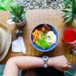 Photo by destiawan nur agustra: https://www.pexels.com/photo/woman-holding-iphone-while-eating-1034940/
