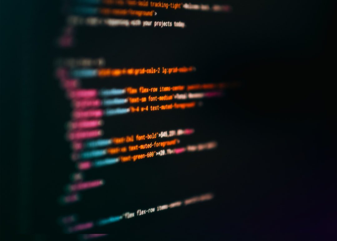 Close-up of colorful code on a screen representing an AI browser automation agent