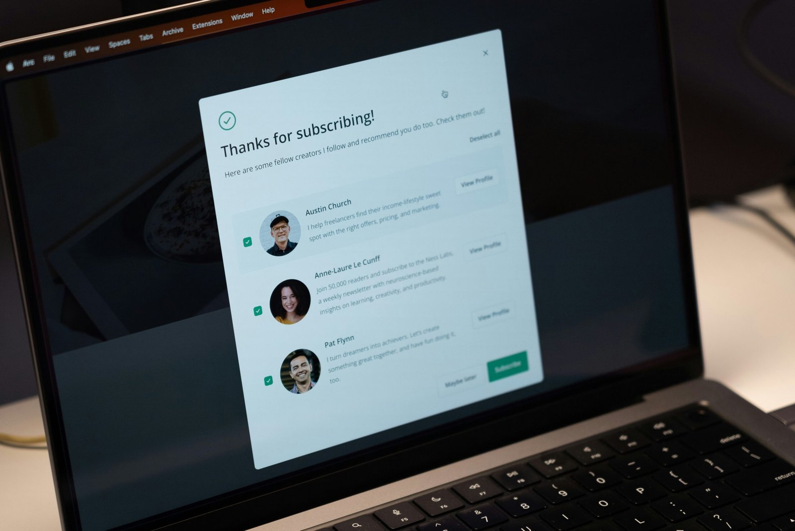 Laptop open showing a digital marketing dashboard interface