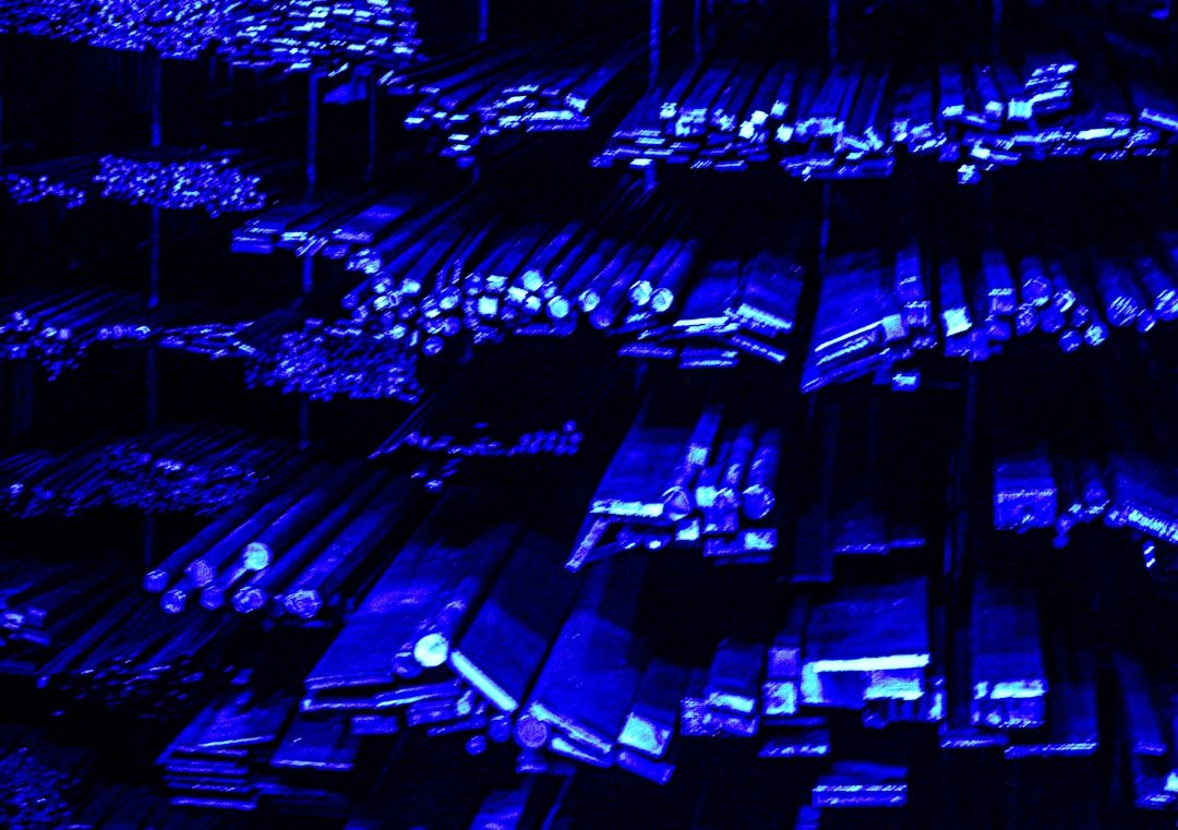 Data center server racks glowing with blue light, representing AI cloud infrastructure
