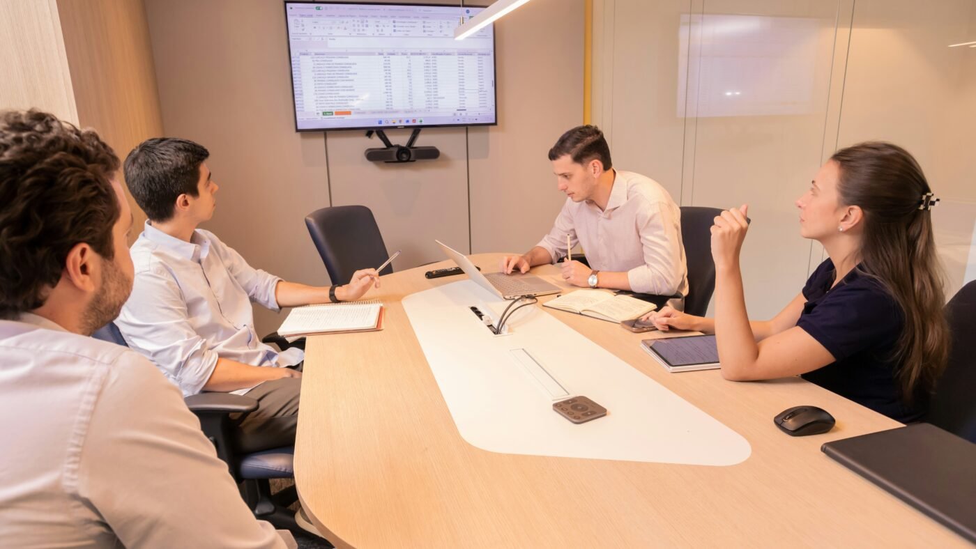 Business meeting around a conference table, representing Automattic's board leadership crisis