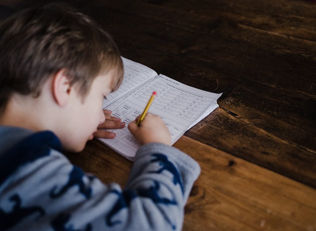 Child working through a math homework problem, representing an AI homework helper app