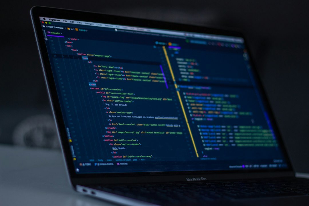 Programming code displayed on a laptop screen