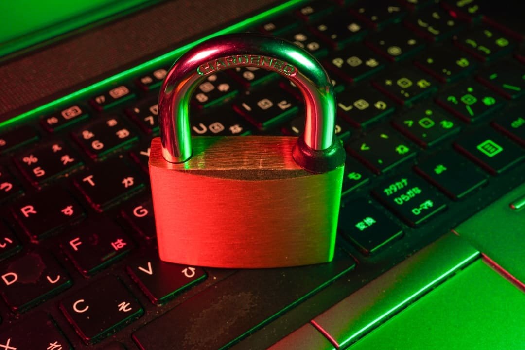 Digital padlock icon over a stream of binary code representing a cybersecurity data breach