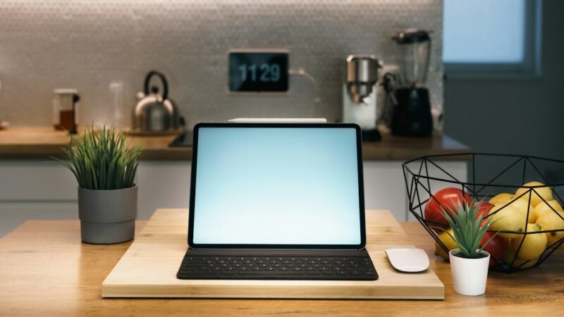 Digital tablet on a kitchen counter, representing Google's CC household AI agent