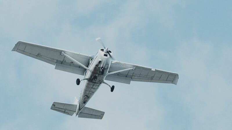 Small single-engine aircraft on short final approach, representing Joby Aviation's autonomous flight