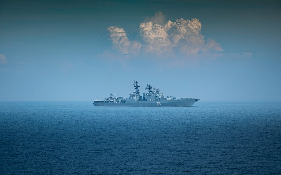 Naval destroyer at sea, illustrating military maritime operations