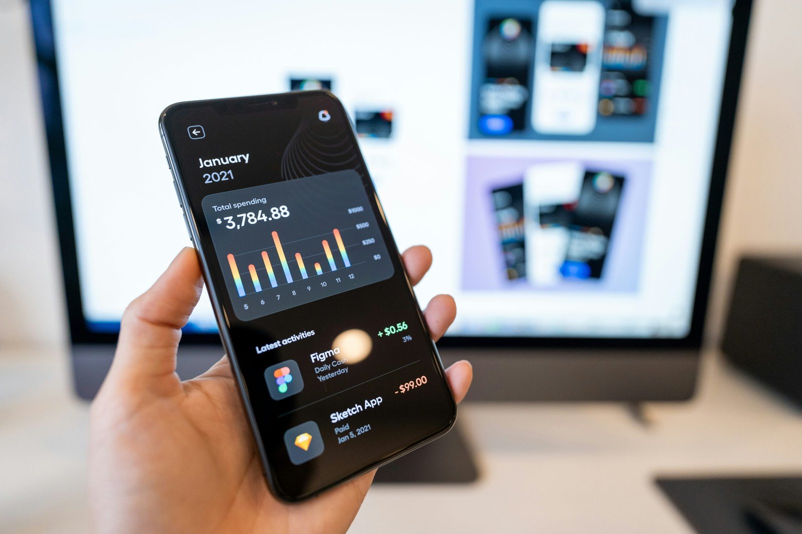 Person holding a smartphone showing a mobile app, illustrating one-tap trading from a timeline