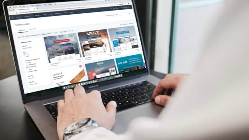Person browsing an online store on a laptop, representing AI-assisted shopping
