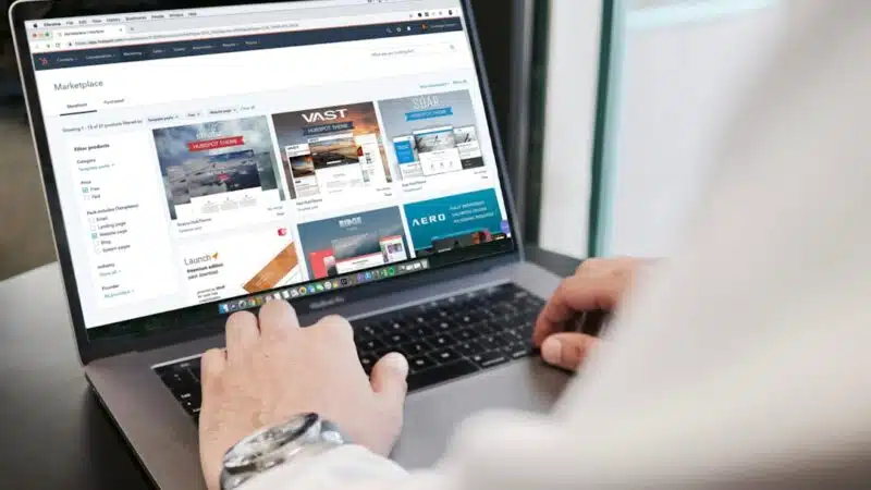 Person browsing an online store on a laptop, representing AI-assisted shopping