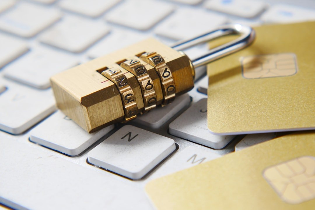 A gold padlock resting on a computer keyboard, symbolizing compromised account security