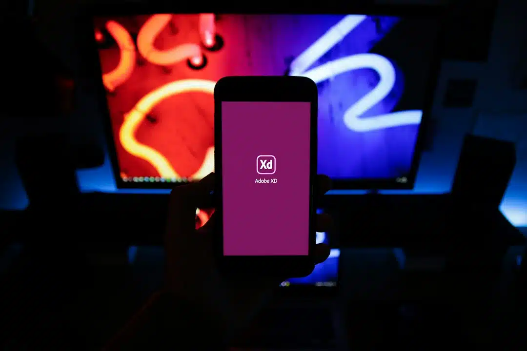 Person holding a smartphone scrolling a vertical video feed, similar to Prime Video's new short-form news format