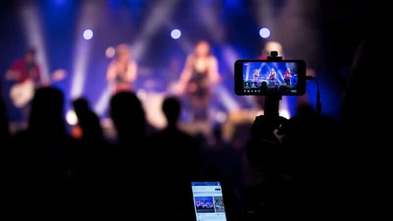 Close-up of a phone screen streaming video, representing short-form content on streaming apps