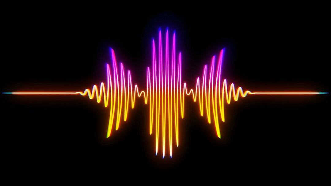 Colorful sound wave on black background representing AI audio technology