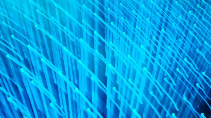 Abstract blue lines and dots representing semiconductor and chip technology