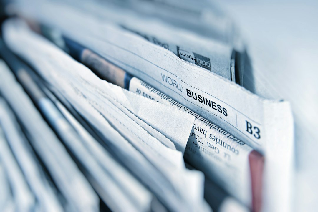 Close-up of business newspaper pages, representing digital publishers and media
