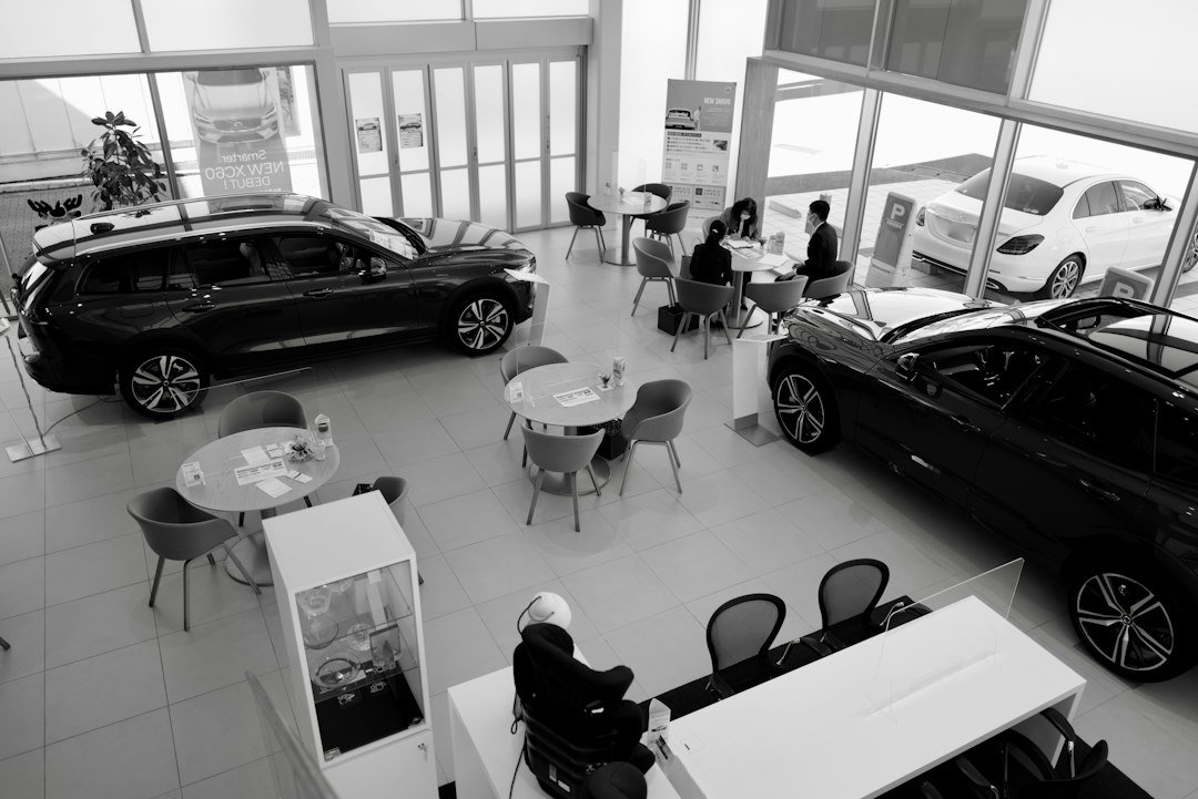 Customers inside a car at a dealership