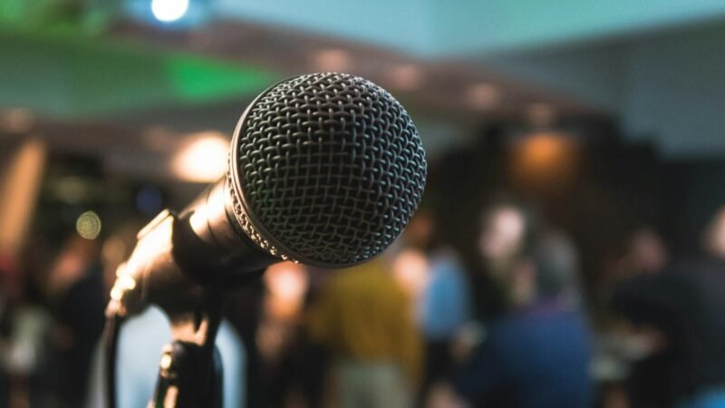 Microphone set up on a stage ahead of a keynote address