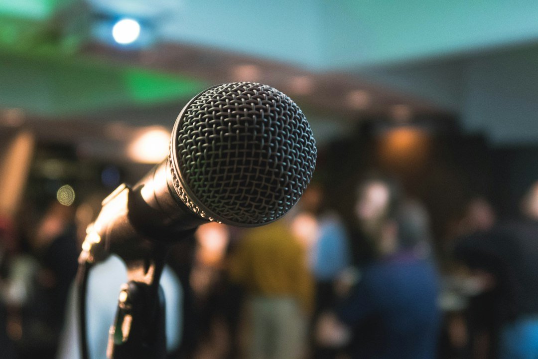 Microphone set up on a stage ahead of a keynote address