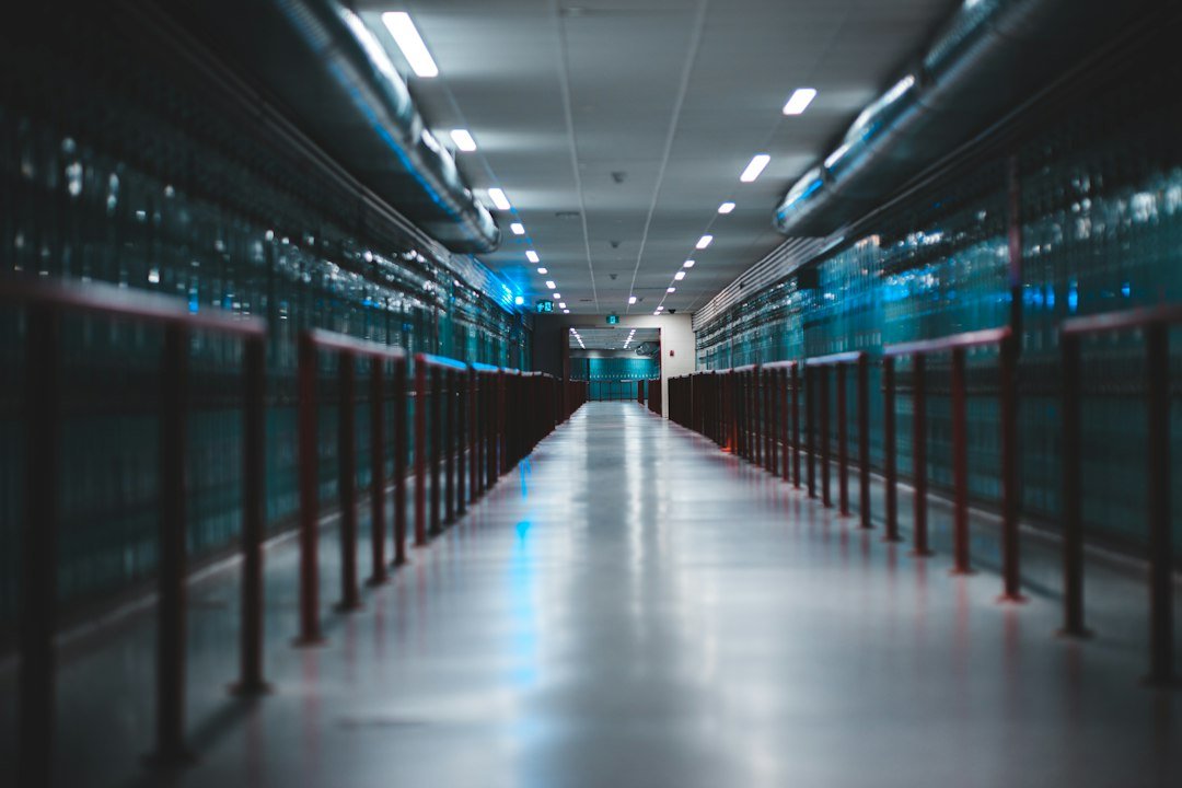Interior hallway of a data center with server racks