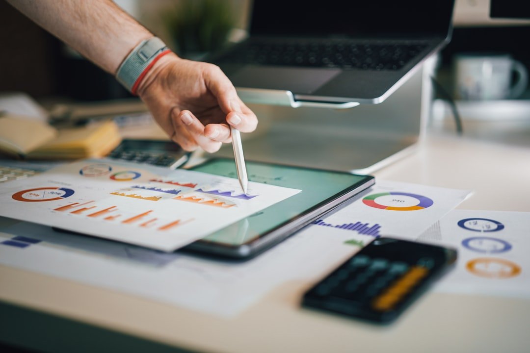 Financial report data presentation with charts and graphs on a desk