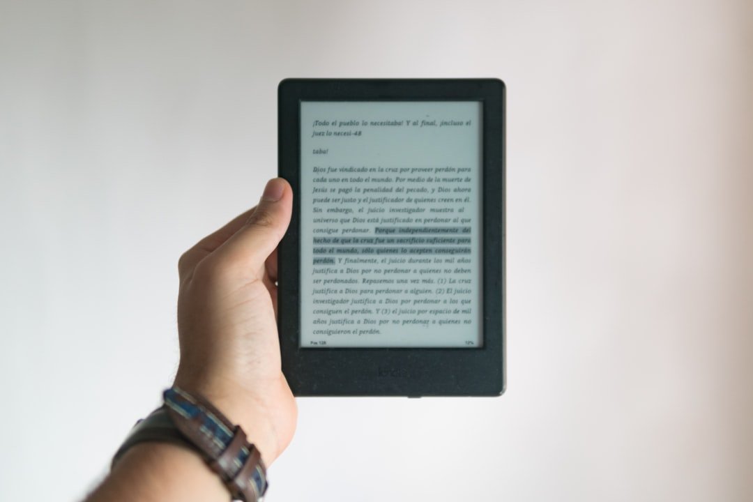 Hand holding an e-reader device