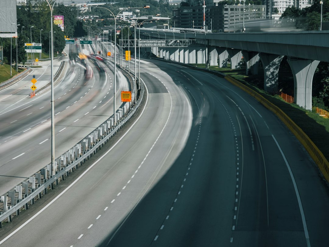 Highway traffic at night, representing a car-sharing service's digital infrastructure