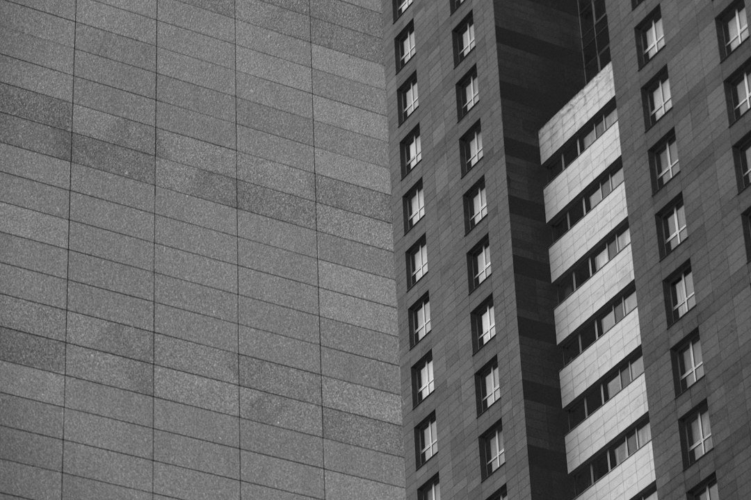 Exterior facade of a modern apartment building with repeating windows