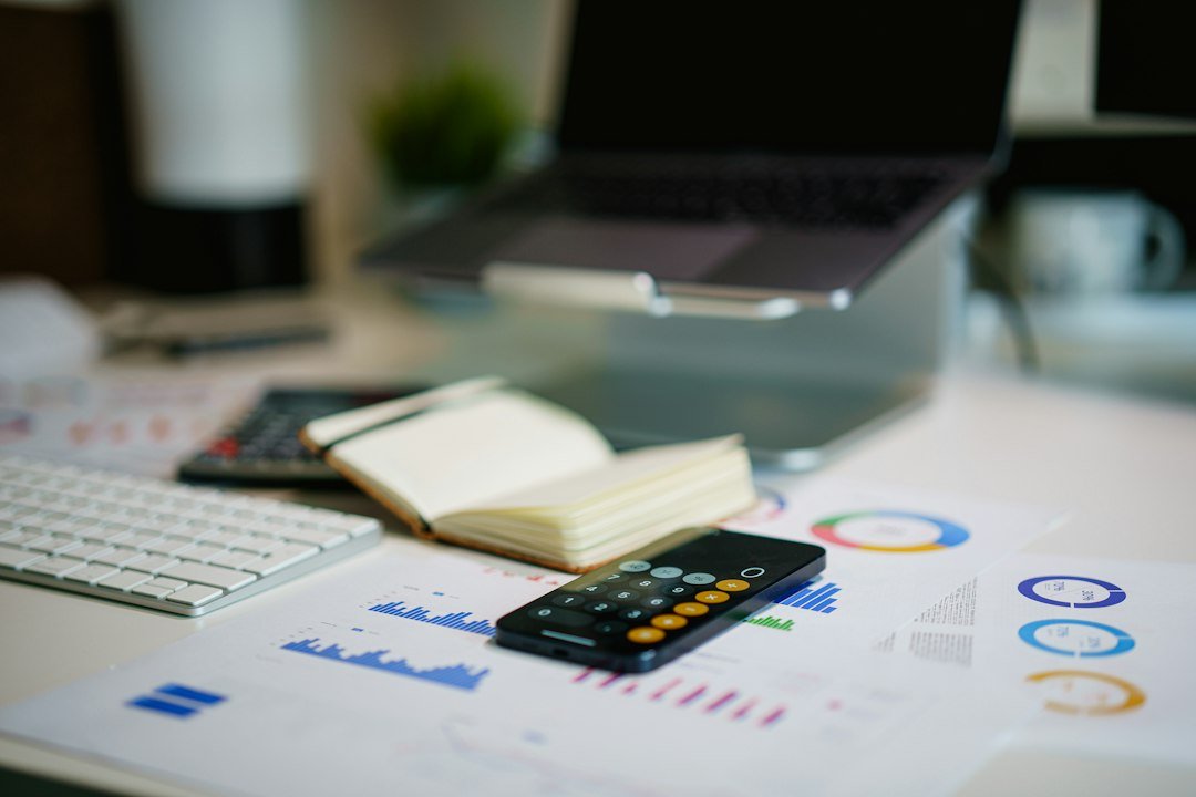 Printed analytics charts showing uneven revenue figures