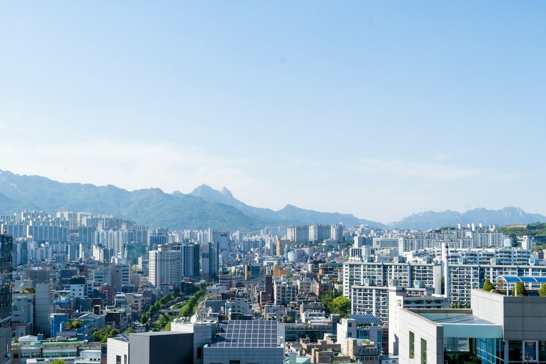 Seoul, South Korea city skyline with mountains
