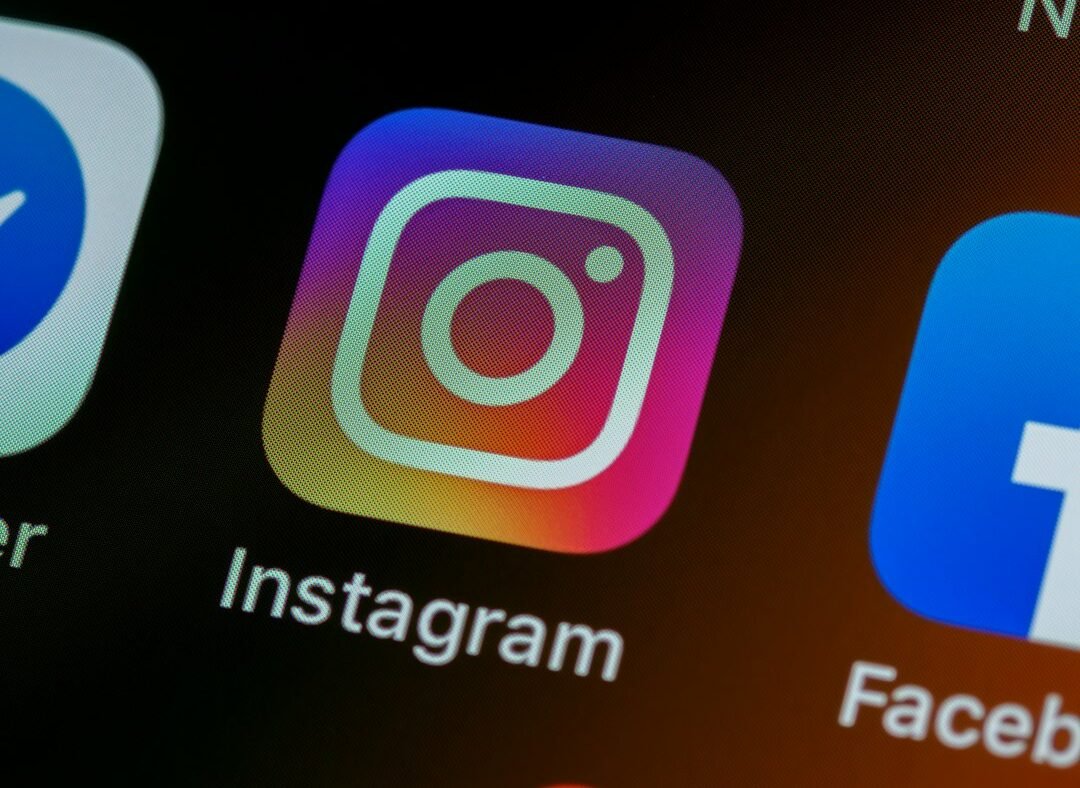 Close-up of smartphone home screen app icons representing social platform changes
