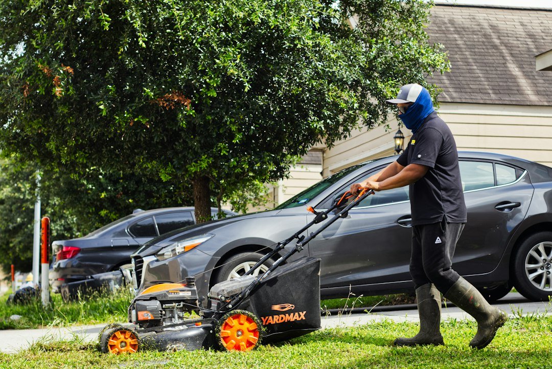 Mowing a front lawn, one of the most common summer side hustles for teens