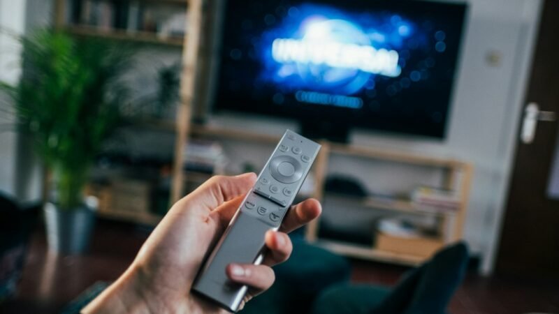 Television screen in a living room representing a streaming homepage