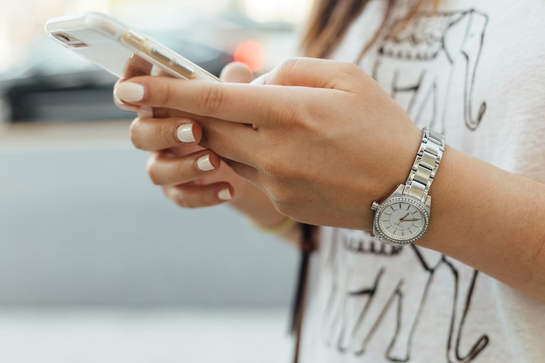 Woman texting friends about weekend plans, illustrating what WTW means in text