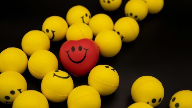 Happy heart and smiley face concept for the yellow heart meaning on Snapchat