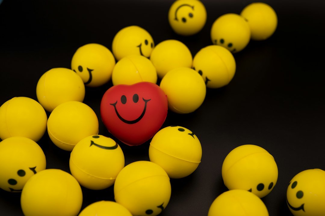 Happy heart and smiley face concept for the yellow heart meaning on Snapchat