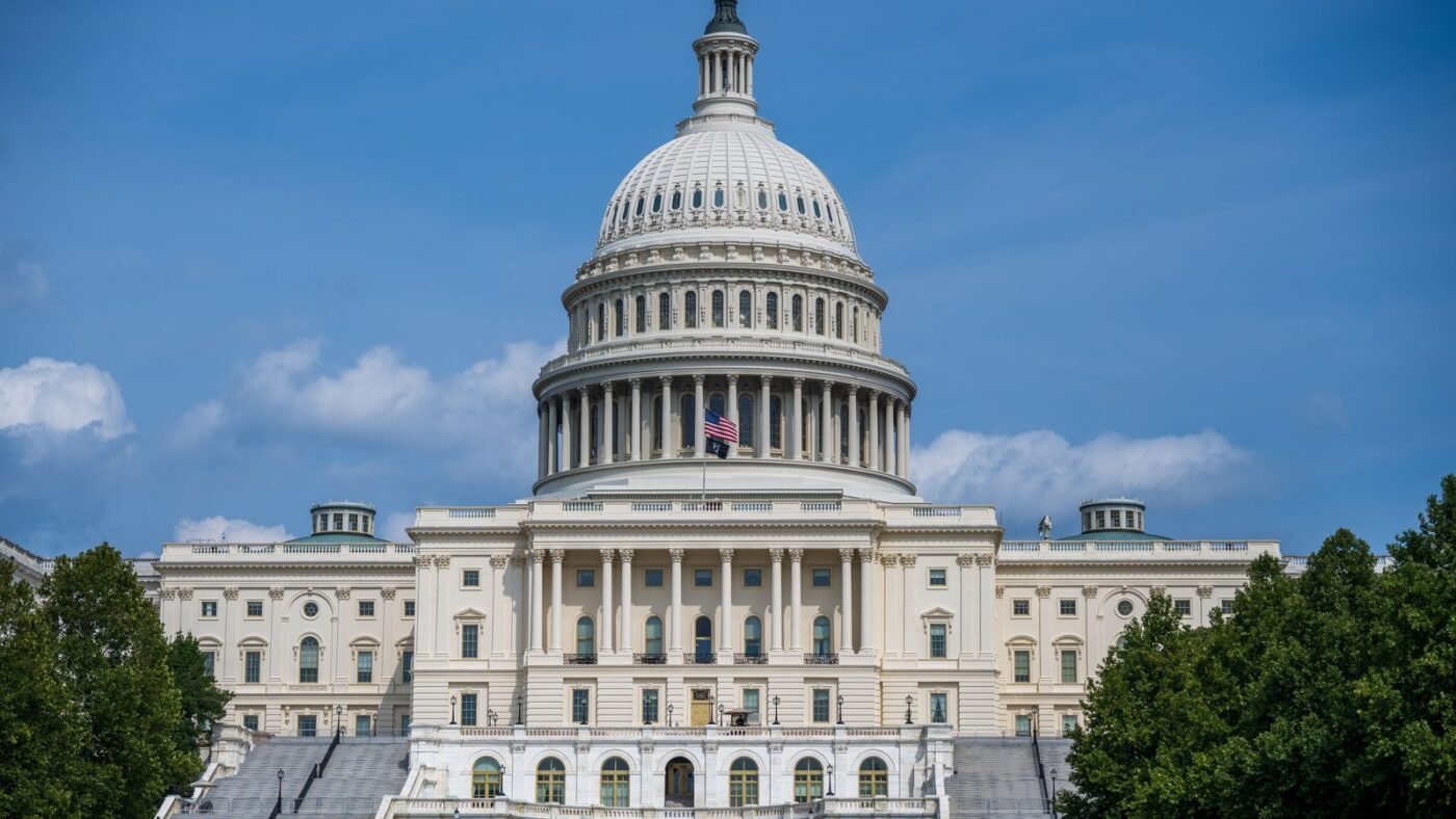 The U.S. Capitol building in Washington, D.C. under a blue sky