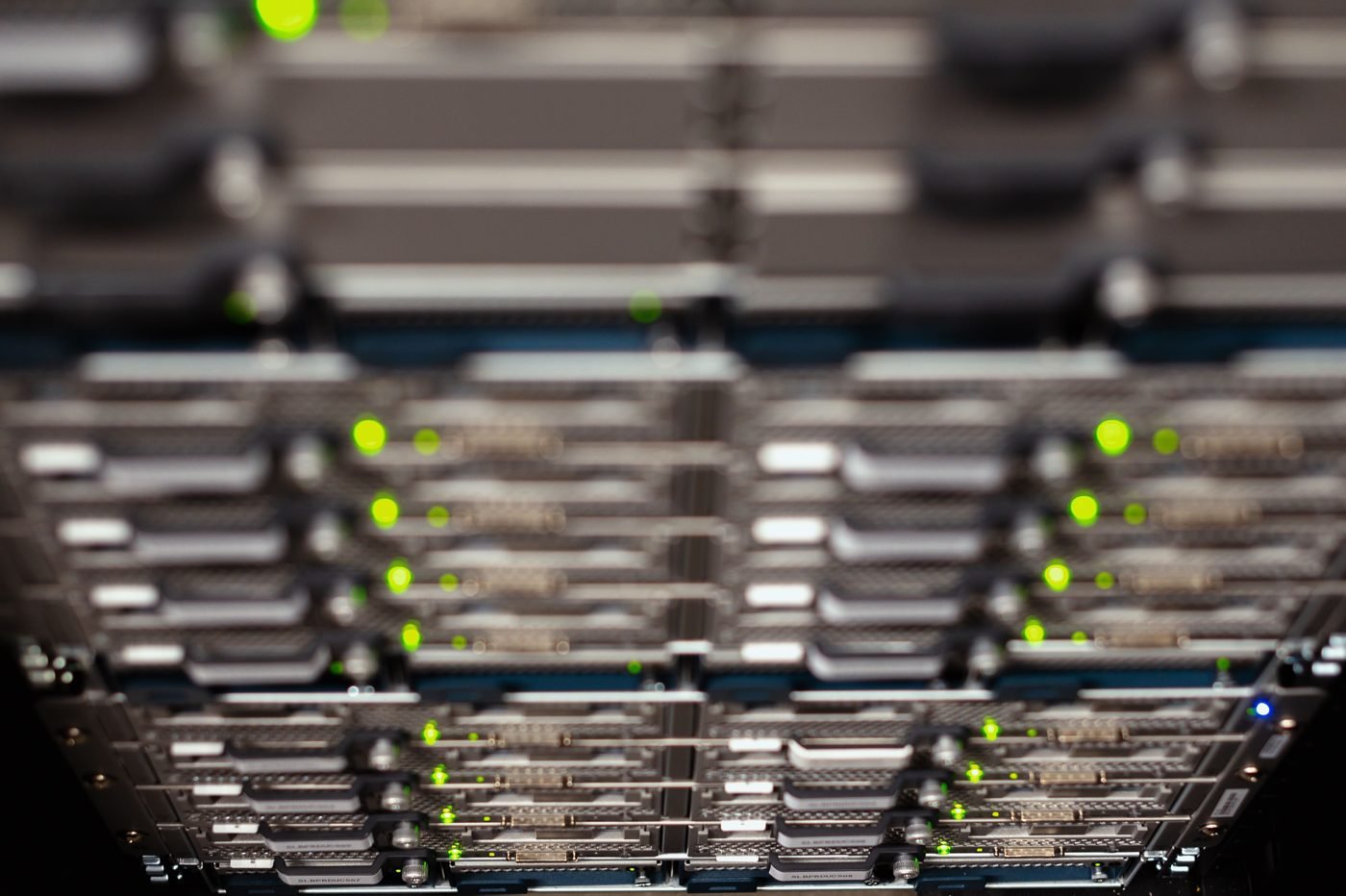 Network server rack with blinking LEDs and Ethernet connections