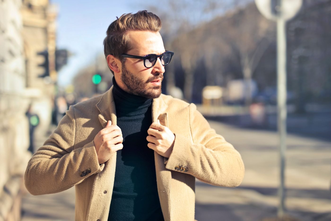 Man wearing sunglasses on a city street