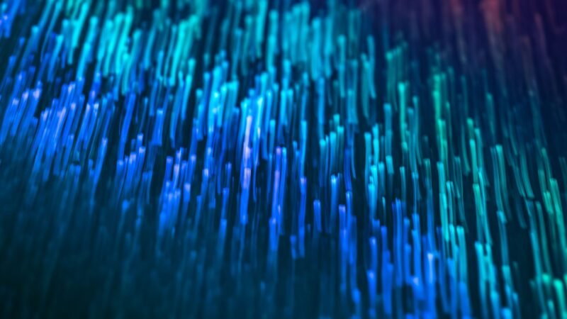 Streaks of glowing blue light suggesting high-speed data