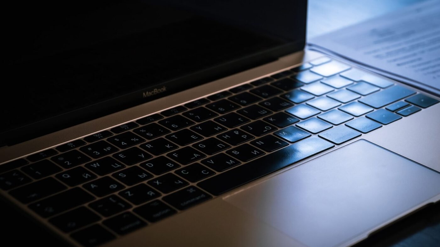 Open laptop keyboard in low light