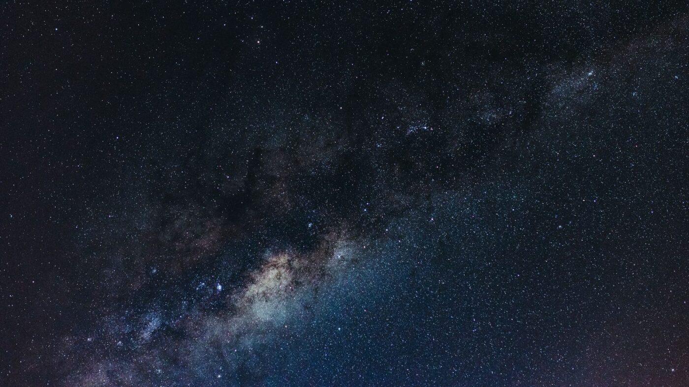 The Milky Way stretching across a dark night sky full of stars