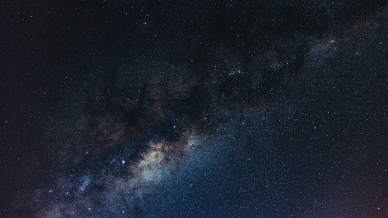 The Milky Way stretching across a dark night sky full of stars