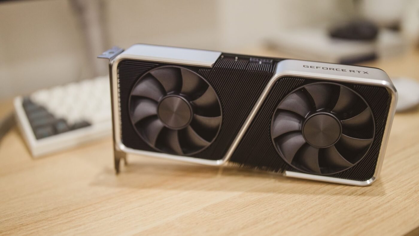 Close-up of a dual-fan Nvidia GeForce RTX graphics card on a desk