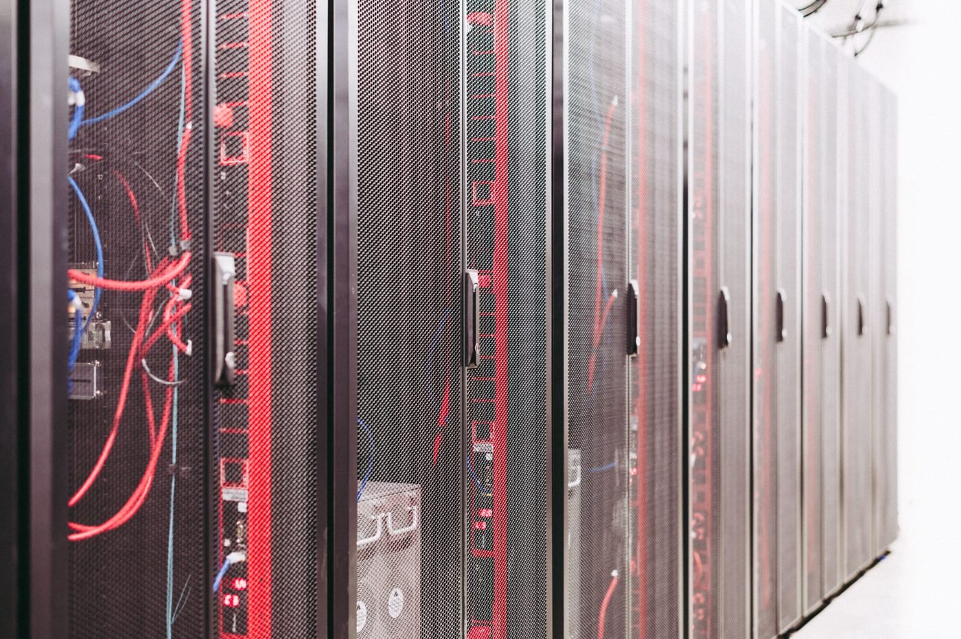 Network server racks and cables in a data center server room