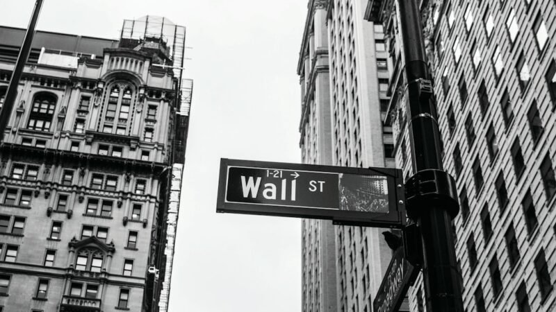Wall Street street sign representing bank financing of the AI data center boom