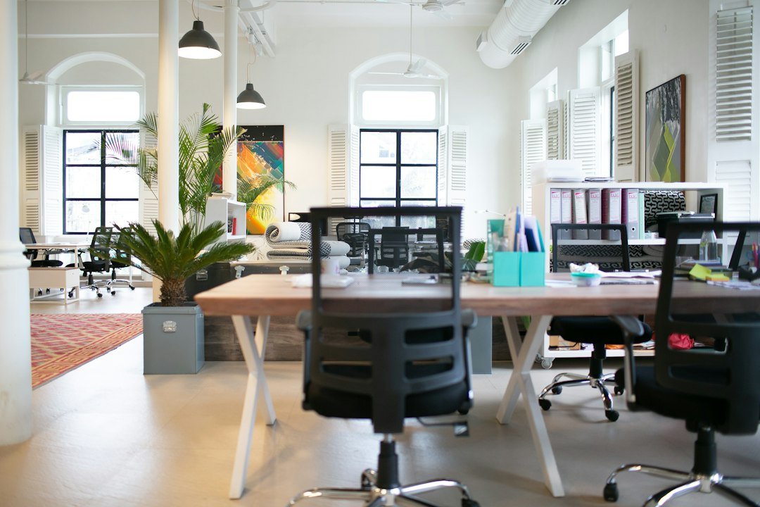 Quiet corporate office space with empty desks