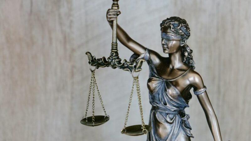Statue of Lady Justice symbolizing a corporate legal team and litigation strategy