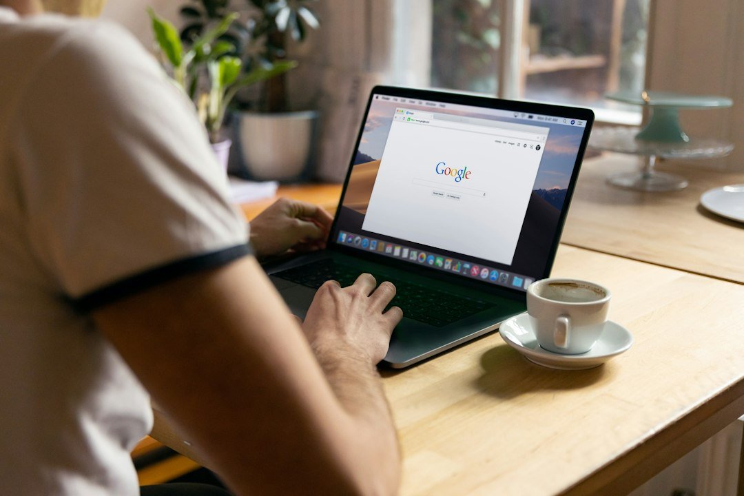 AI Mode now runs on a different model under the hood Person searching Google on a laptop in a cafe