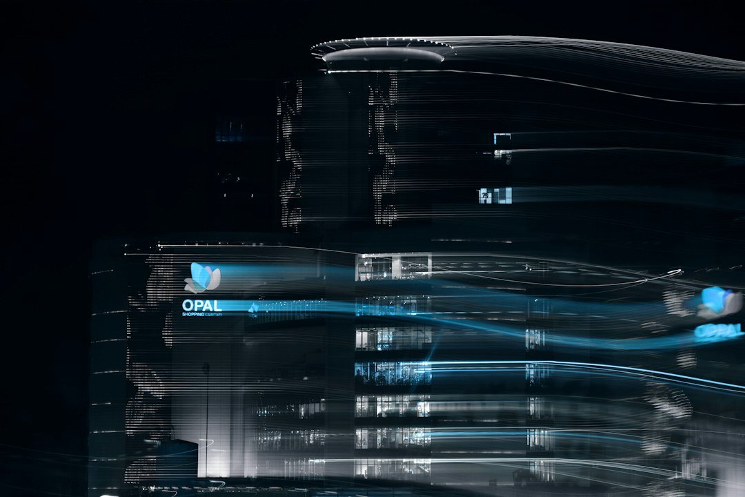 Abstract blue and gray futuristic digital interface representing AI cloud computing